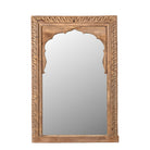 White background image of a Ronavraj reclaimed teak wood mirror made from an old Indian window frame with carved border and shaped arch, 82x121cm