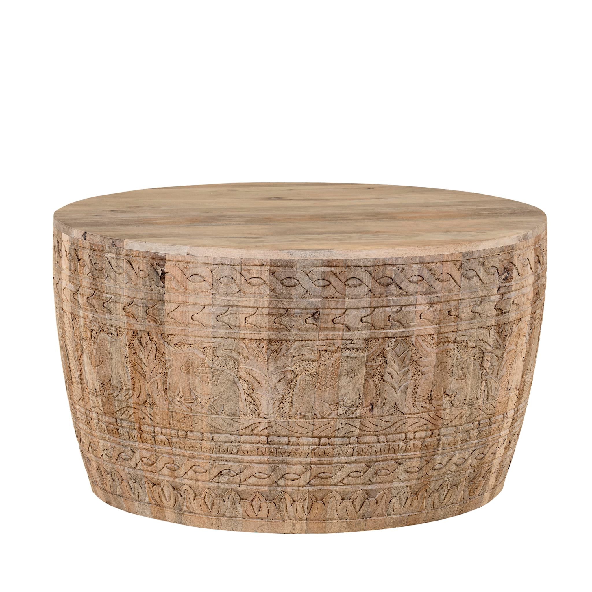 White background image of a hand-carved mango wood coffee table with intricate botanical and geometric carvings.