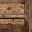 Close up image of a tall bathroom cabinet made from reclaimed wood with six drawers and rustic finish, 50 × 35 × 110 cm.