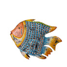White background image of a Saatvik hand painted freestanding metal fish sculpture with vibrant blue, orange and yellow detailing, handcrafted decorative home accessory, 107x15x80cm.