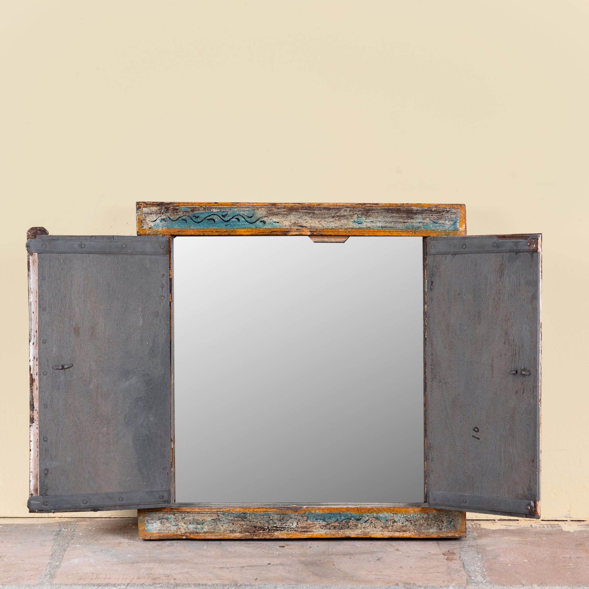 Image showing open wings of a sacred Lotus antique reclaimed wood mirror with hand-painted Hindu artwork on an authentic reclaimed vintage wooden mirror frame, 50x50x5cm.