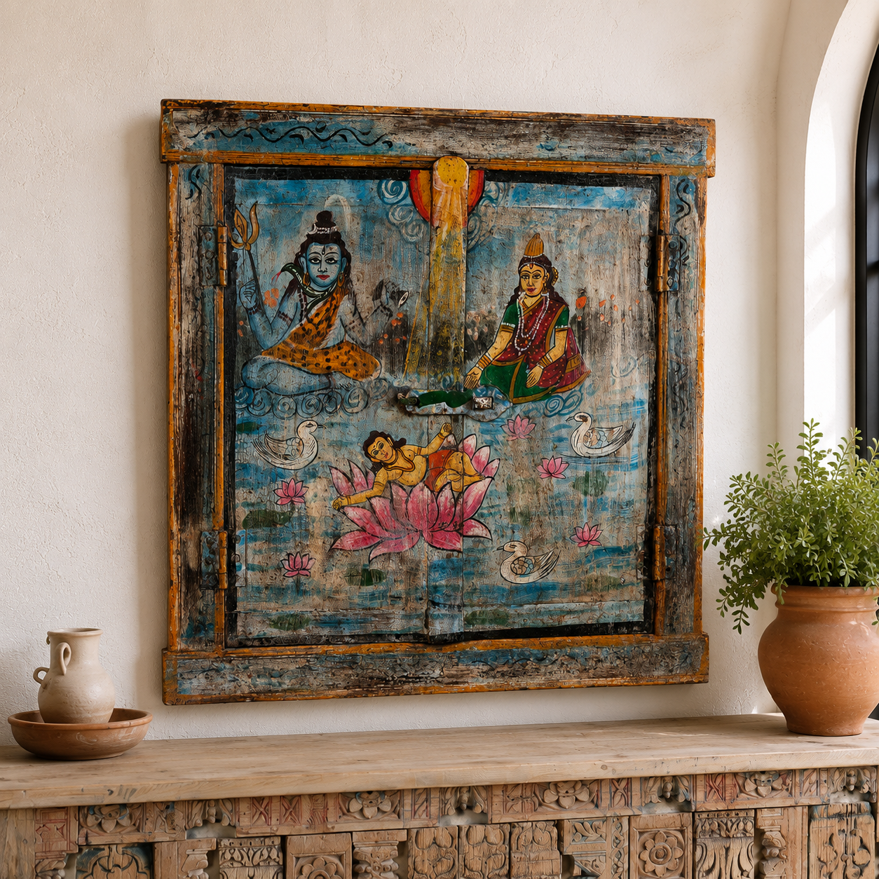 Lifestyle image of a sacred Lotus antique reclaimed wood mirror with hand-painted Hindu artwork on an authentic reclaimed vintage wooden mirror frame, 50x50x5cm.