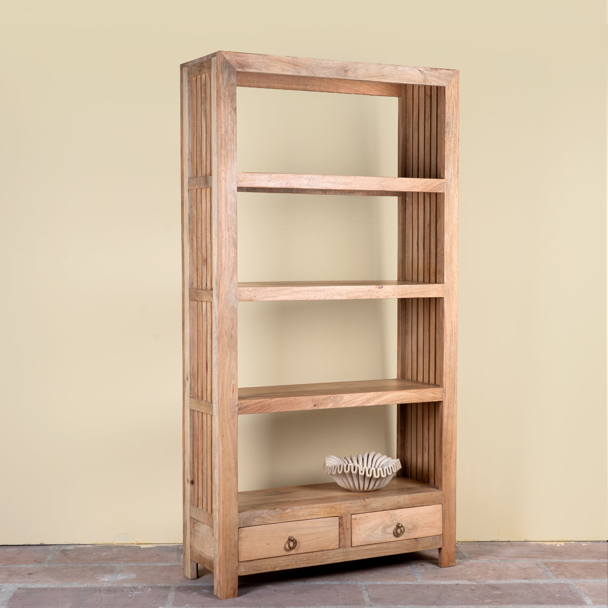 Sahadev wide mango wood shelving unit with open shelves and two drawers 190cm
