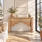 Lifestyle image of a Saiyan reclaimed teak wood console table with hand-carved old Indian house elements and architectural front 140cm