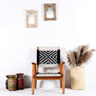 Acacia wood chair with black-and-white handwoven cotton rope seat and backrest; artisanal wooden armchair, 61 × 47 × 83 cm.