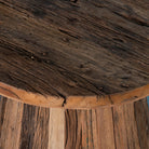 Close up image of a sustainable driftwood coffee table with conical base, handcrafted from reclaimed wood with rustic minimalism, 45 × 54 cm.