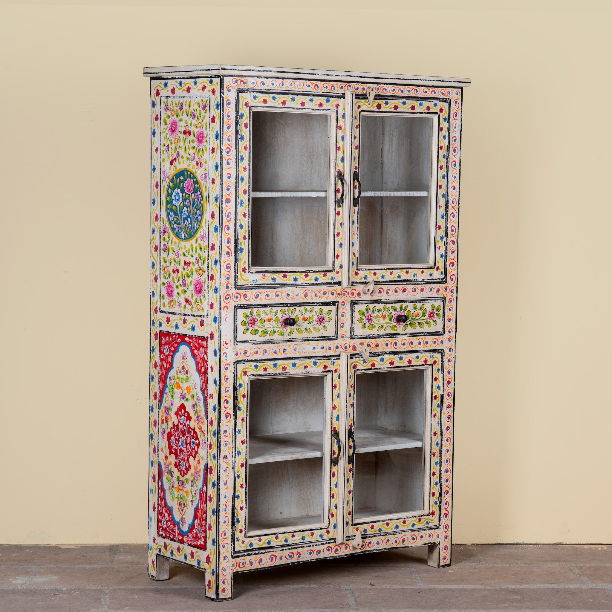 Side angle image of a Sasha hand painted reclaimed wood display cabinet with glass doors 150cm
