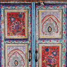 Close up image of a Saya hand painted reclaimed wood cabinet with colourful Indian artwork 180cm