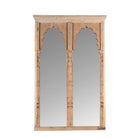 White background image of a antique Indian arch mirror Shalee made from a reclaimed teak wood double window with carved arches. A unique piece of rustic wall art and functional décor for bohemian or vintage-inspired interiors.