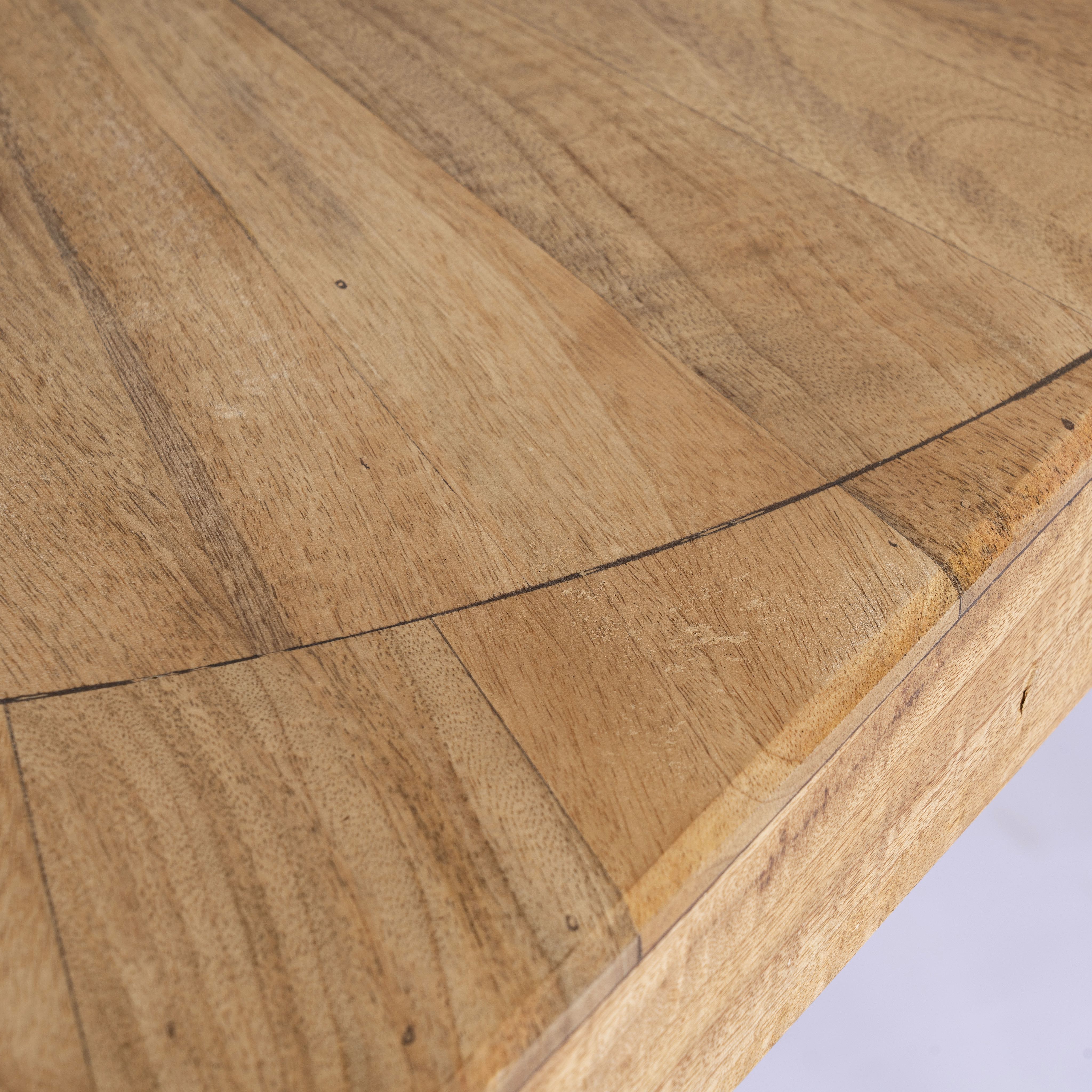 Shankhin mango wood dining table featuring an intricately patterned natural wood tabletop with a brass-plated iron base and contemporary industrial design, 180cm.