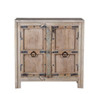 White background picture of a unique old Door cupboard finely hand carved in bleached teak wood, driftwood design with iron fittings.