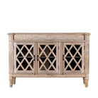 White background image of a rustic sideboard made of Mango wood with hand-carved details and glass panelled doors featuring a diamond lattice design.