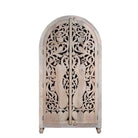 White background image of a hand-carved mango wood wardrobe with arched top and intricate peacock floral design – artisanal Indian bedroom furniture.
