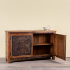 Side angle image with open door of a Sitara reclaimed wood sideboard with antique Indian iron ceiling panel doors 155cm