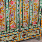 Close up image of a Siyan hand painted reclaimed wood Boho cabinet with floral motifs 152cm