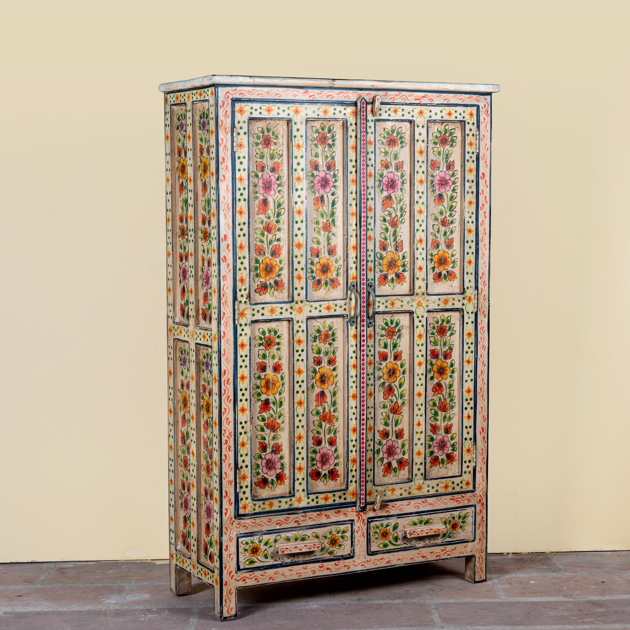 Side angle image of a Smaya hand painted reclaimed wood Boho cabinet with floral artwork 152cm