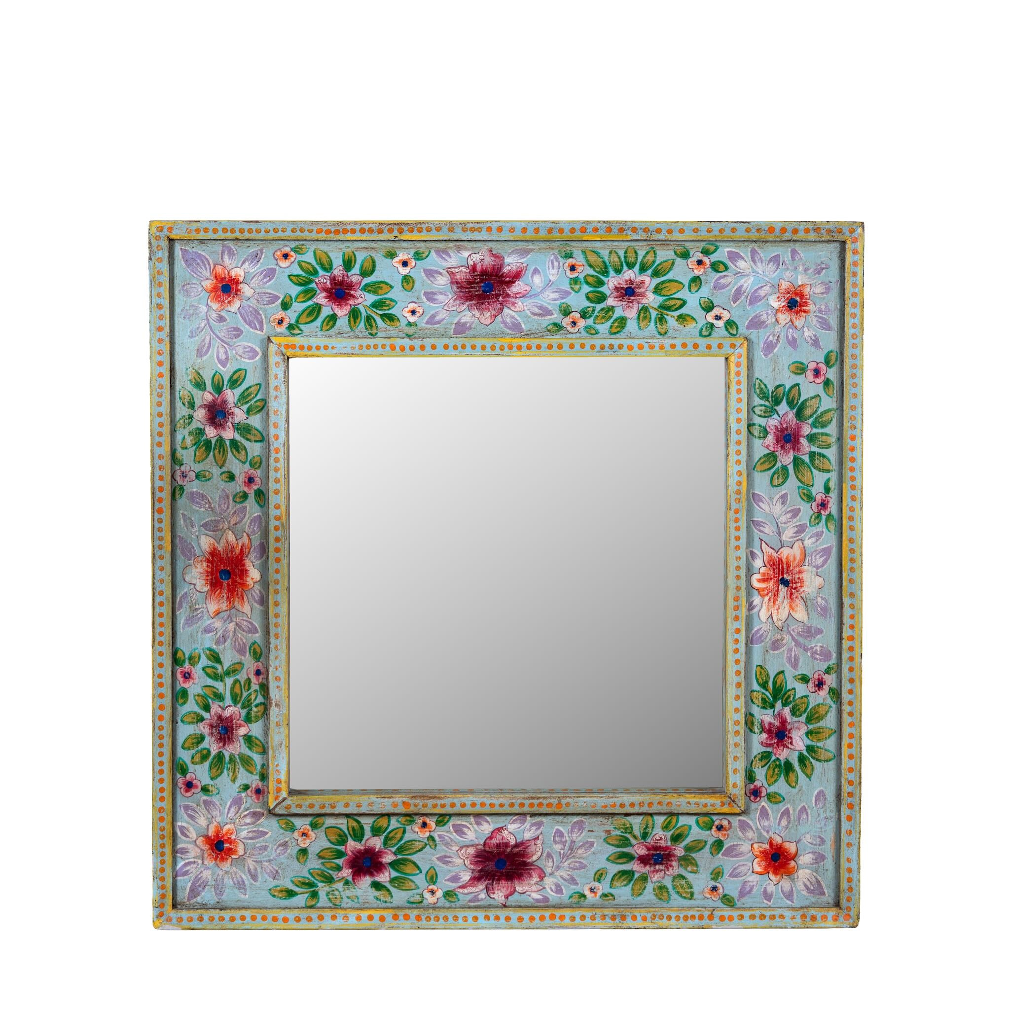 White background image of a Snehal hand-painted reclaimed wood wall mirror featuring colourful floral artwork and artisan detailing, 90x90cm.