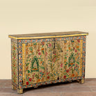 Side angle image of a Soham hand painted reclaimed teak wood storage box with colourful floral and botanical motifs 141cm