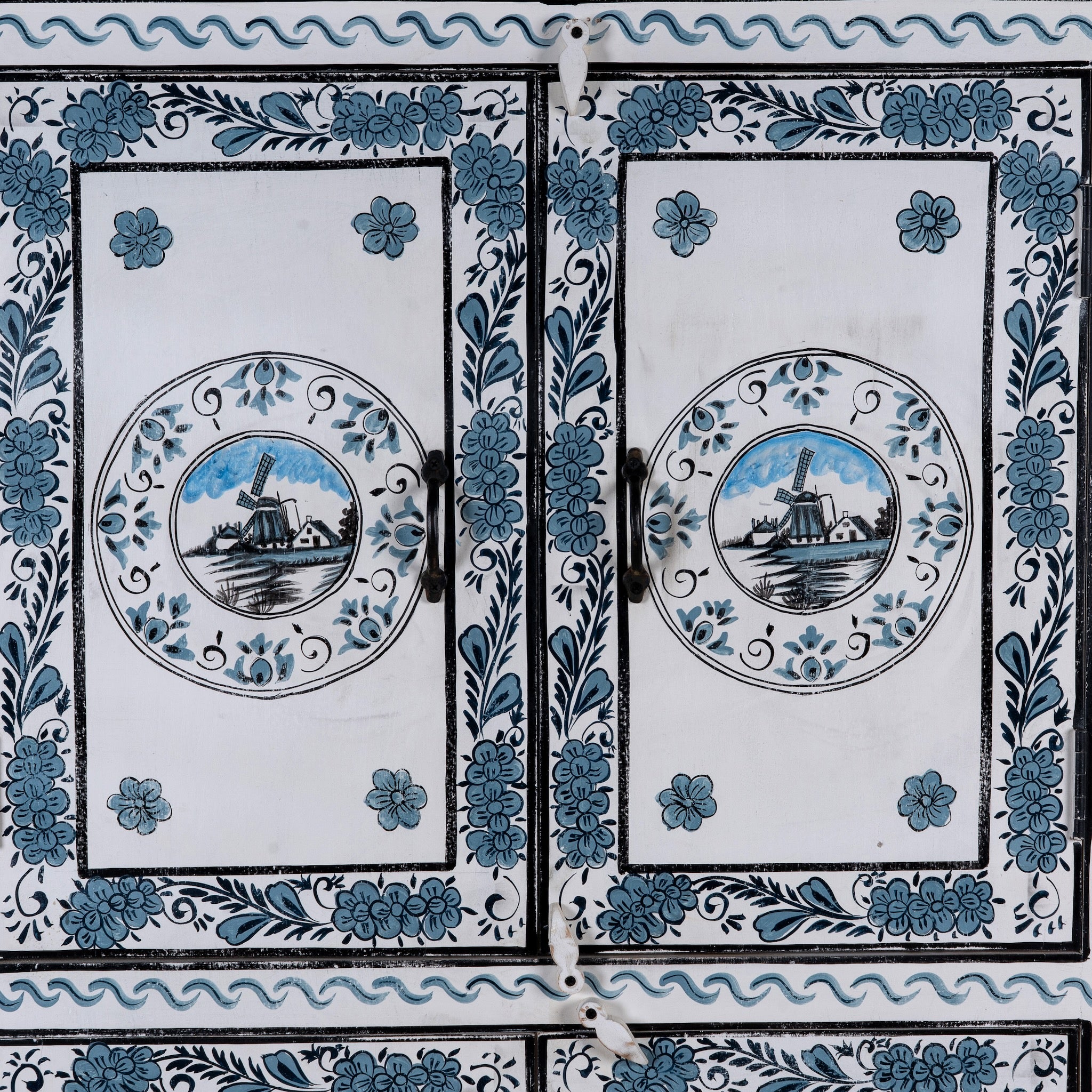 Close up image of a Srika limited edition hand painted reclaimed wood cabinet inspired by Delft porcelain 150cm