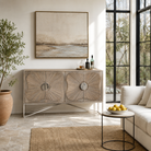 Lifestyle image of a handcrafted mango wood sideboard with floral-inspired sunburst carving, grey wash finish, and silver accents – mid century style furniture for elegant living spaces.