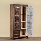 Open door image of a Srinika vintage Indian wardrobe with mango wood body and old hand-carved teak house door, 94x42x195cm