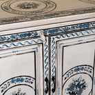 Close up image of a Suchi limited edition reclaimed wood sideboard with Delft inspired hand painted motifs 170cm