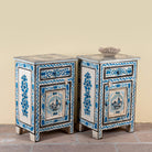 Side angle image of a Suhasin limited edition reclaimed wood bedside table set with Delft inspired hand painted motifs