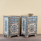Side angle image of a Sunaina limited edition reclaimed wood bedside table set with Delft inspired hand painted motifs