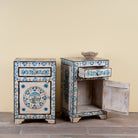 Side angle image with open door of a Sunaina limited edition reclaimed wood bedside table set with Delft inspired hand painted motifs