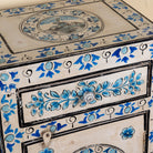 Close up image of a Sunaina limited edition reclaimed wood bedside table set with Delft inspired hand painted motifs