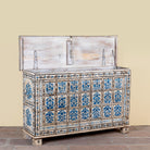 Side angle image with open lid of a Sur limited edition reclaimed wood storage chest with Delft inspired hand painted motifs