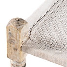 Close up image of a traditional Indian day bed made from reclaimed teak with handwoven cotton rope; unique Indian furniture, 160 × 93 × 62 cm.