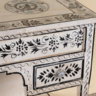 Close up image of a Swaha limited edition reclaimed wood desk with Delft inspired hand painted motifs