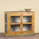 Side angle image of a Tushar hand-painted reclaimed wood display cabinet with colourful floral design and two doors 122cm