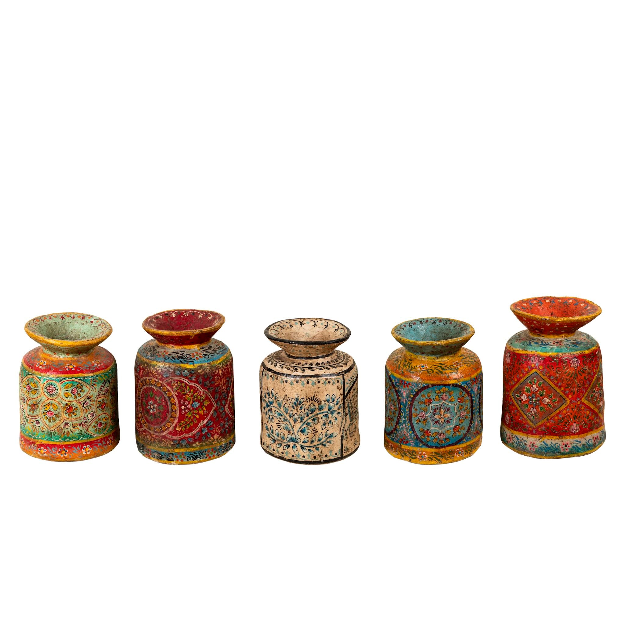 White background image of a hand-painted papier-mâché vase Udanth in mixed colours with floral and folk motifs. A vintage home accessory and unique Indian decoration ideal for vintage home decor or use as a decorative statement vase.
