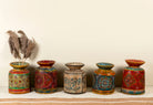 Hand-painted papier-mâché vase Udanth in mixed colours with floral and folk motifs. A vintage home accessory and unique Indian decoration ideal for vintage home decor or use as a decorative statement vase.