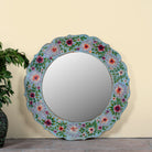 Ujjwal hand-painted round reclaimed wood mirror with colourful floral artwork, turquoise vintage frame, and artisan detailing, 90cm diameter.