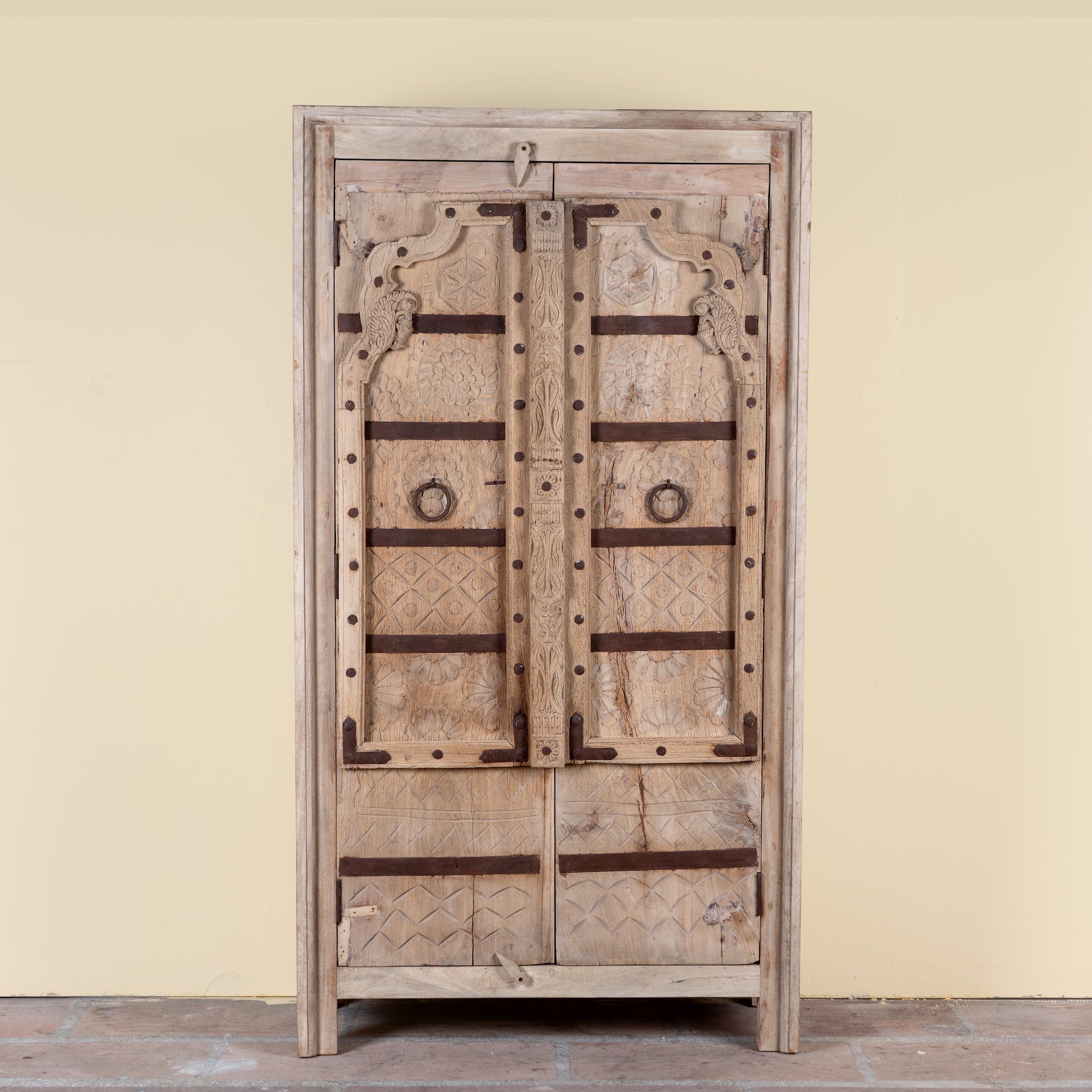 Lakshya bleached mango wood cabinet with original hand carved Indian door panels and iron fittings 167cm