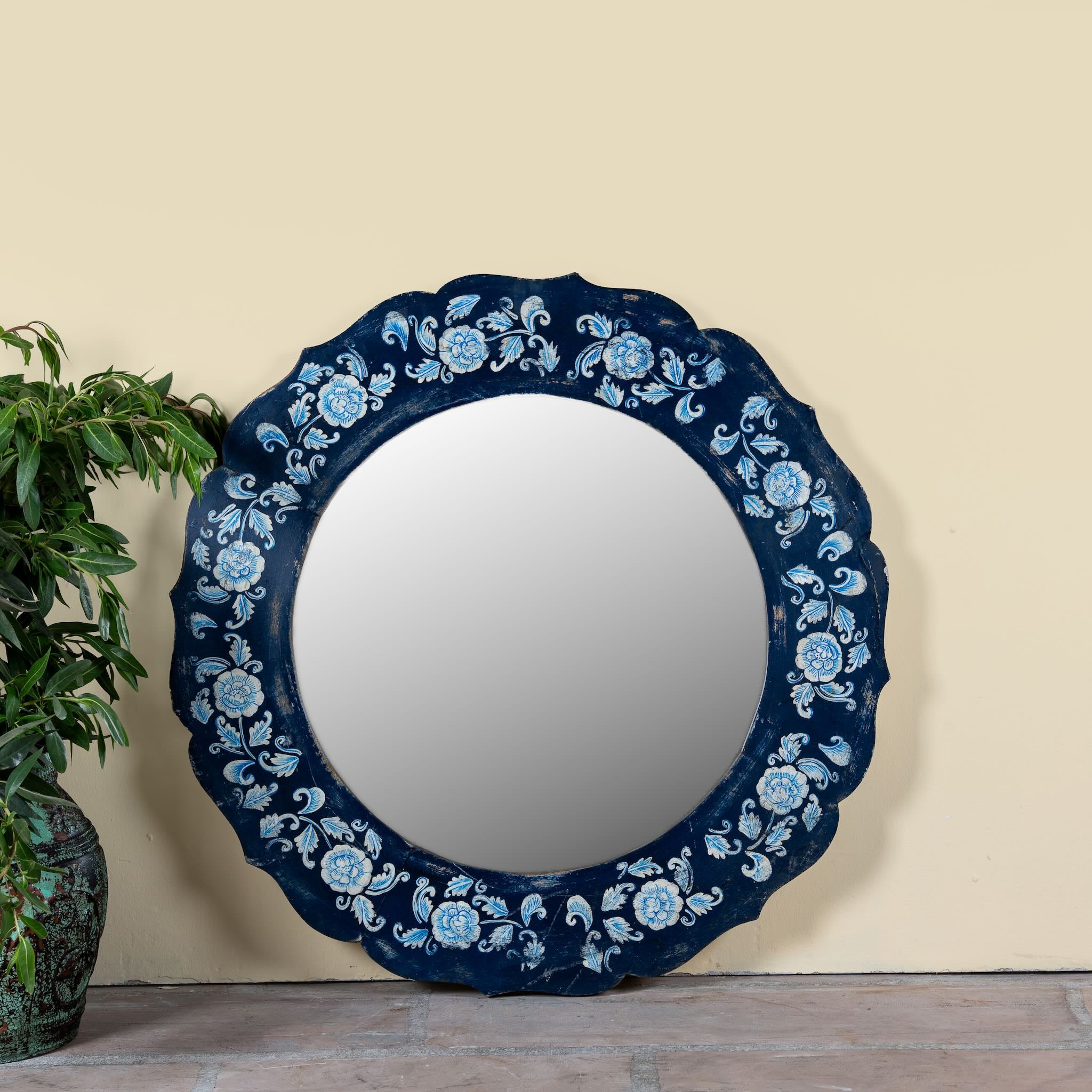 Uttam hand-painted round reclaimed wood mirror with deep blue floral frame, vintage artisan detailing, 90cm diameter.