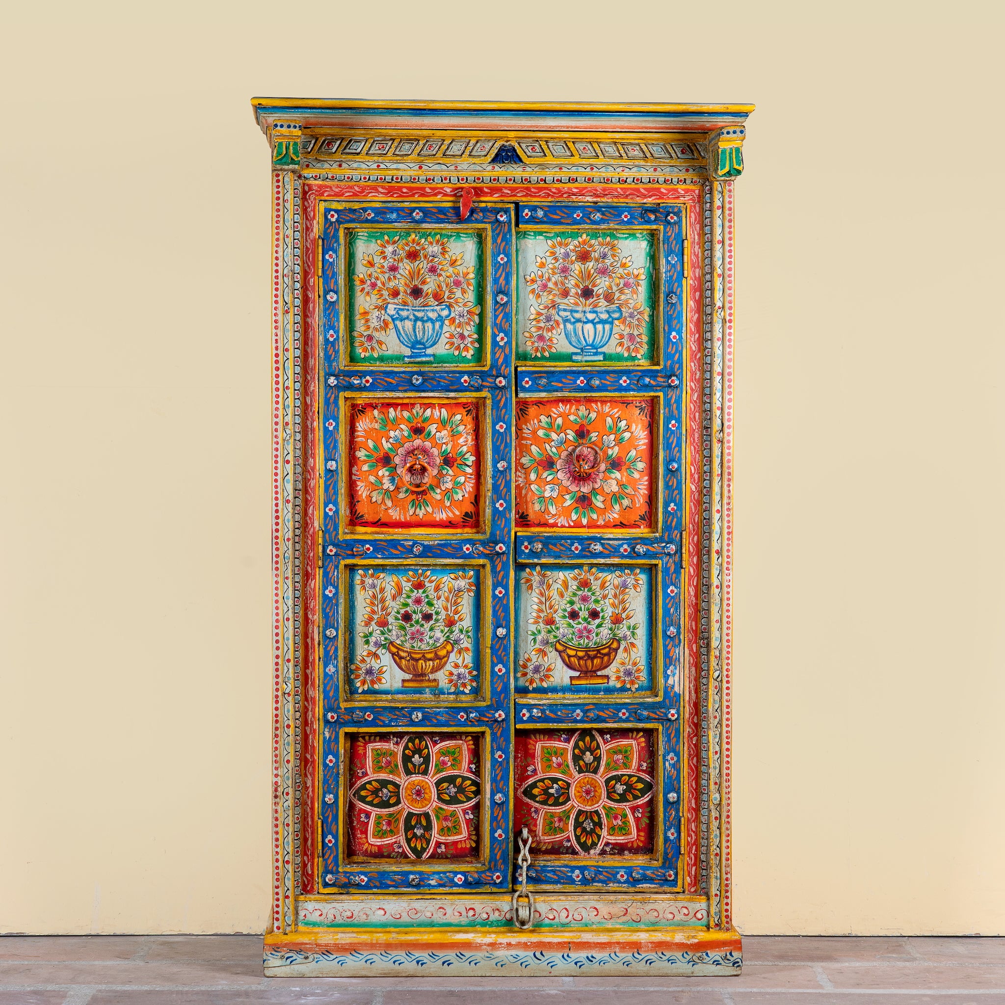 Image of a hand-painted teak wood cabinet with floral motifs; teak wood furniture for bohemian interiors, 105 × 55 × 177 cm.