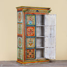 Open door image of a hand-painted teak wood cabinet with floral motifs; teak wood furniture for bohemian interiors, 105 × 55 × 177 cm.