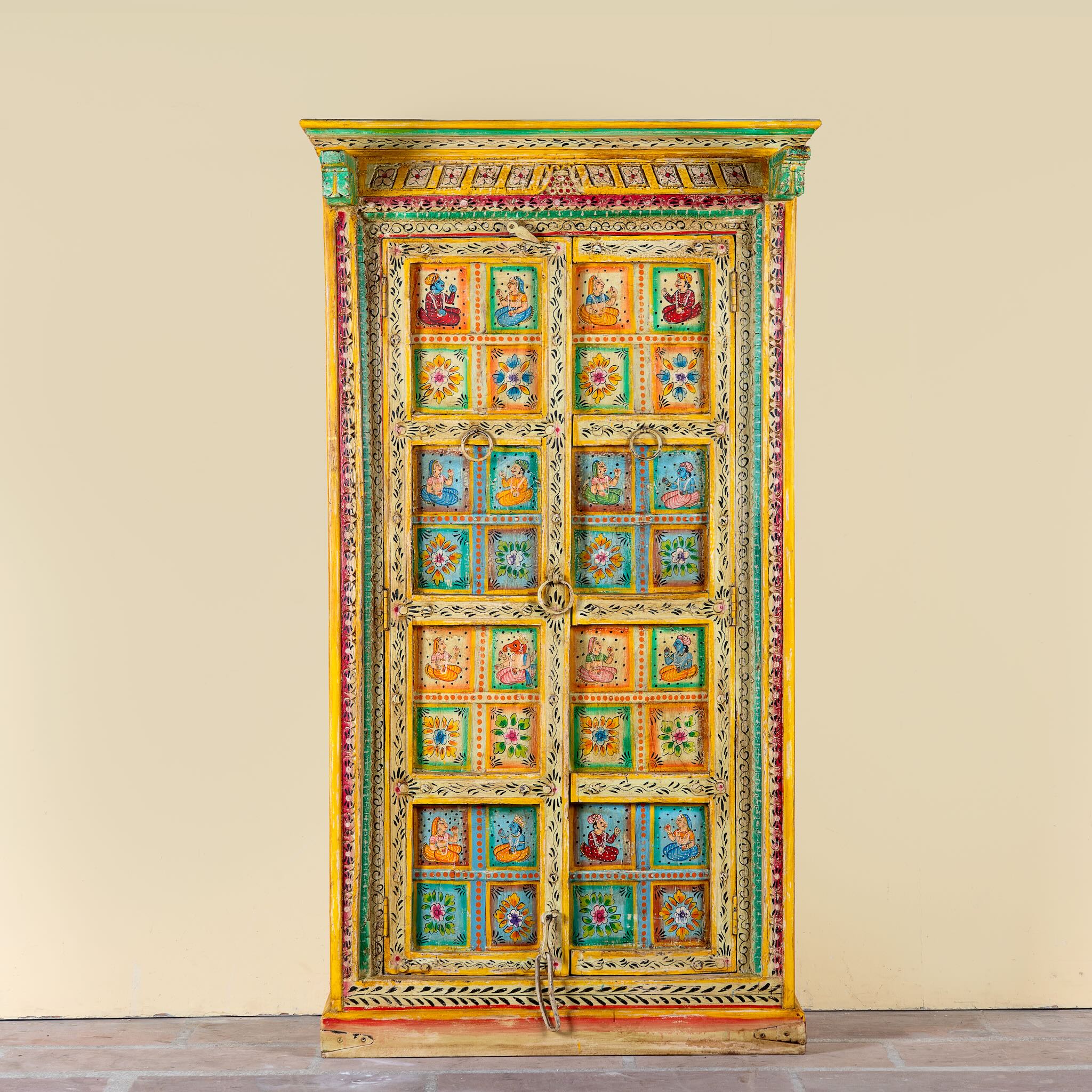 Hand painted wardrobe made of teak wood with floral motifs; unique furniture inspired by Indian artistry, 104 × 50 × 186 cm.