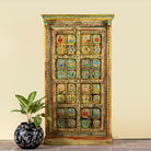 Hand painted wardrobe made of teak wood with floral motifs; unique furniture inspired by Indian artistry, 104 × 50 × 186 cm.