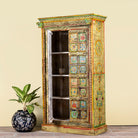 Open door image of a hand painted wardrobe made of teak wood with floral motifs; unique furniture inspired by Indian artistry, 104 × 50 × 186 cm.