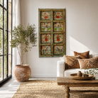 Lifestyle image of a Vedant hand-painted teak wood wall decoration featuring eight illustrated folklore panels, an expressive and detailed wall decoration from antique Indian door panels.