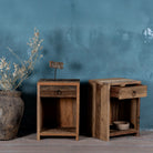 Side view image with open drawer of a reclaimed wood bedside table with drawer and open shelf – handcrafted driftwood furniture designed for rustic minimalism and natural interiors.