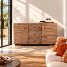 Lifestyle image of a Viara carved reclaimed wood sideboard with drawers, bleached finish and original hand-carved Indian teak house elements, 160x45x90cm