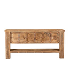 White background image of a Vihanraj reclaimed teak wood console table with original Indian door front, iron fittings and lower storage shelf 178cm