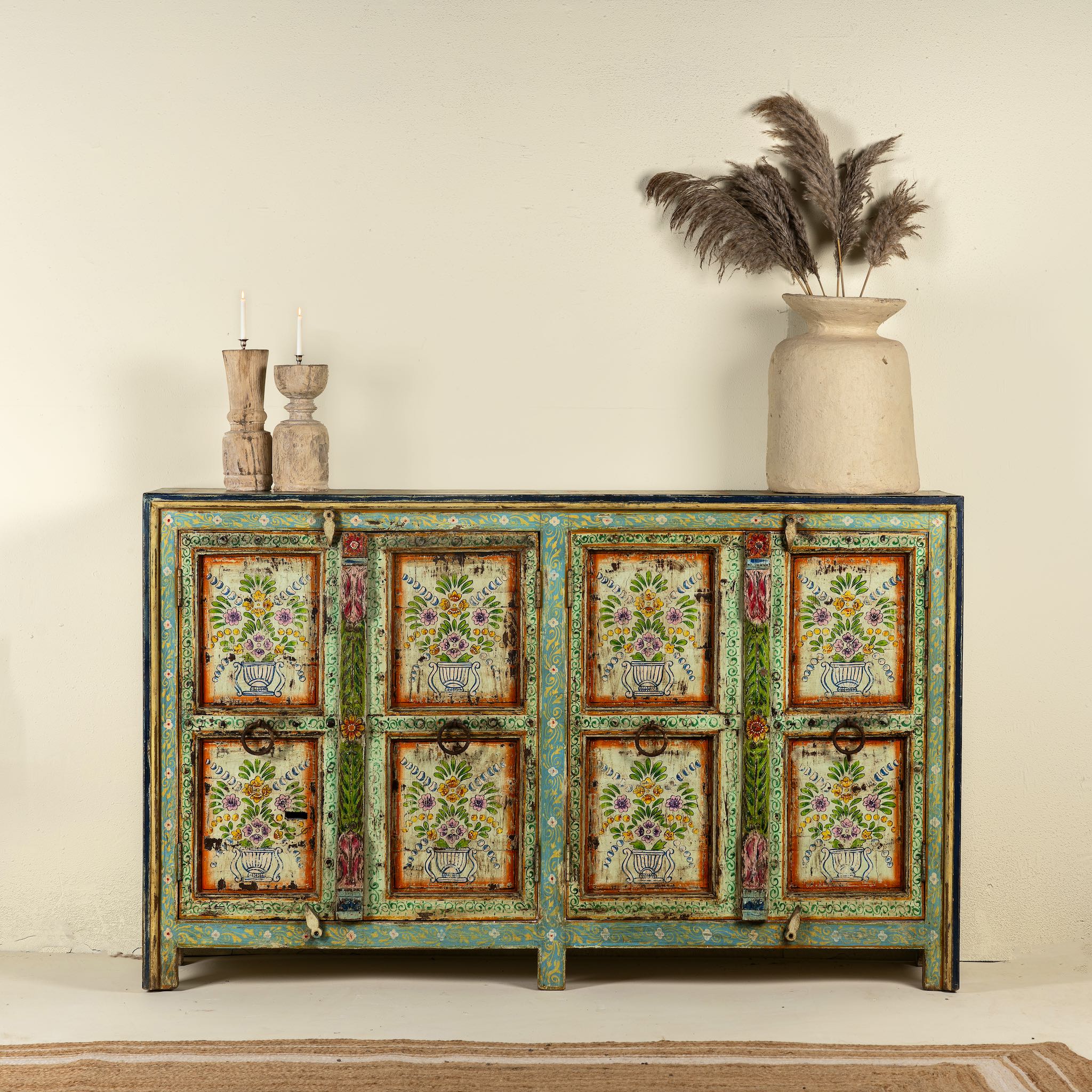 Reclaimed wood sideboard with hand painted floral motifs and distressed finish; artisanal storage furniture for bohemian interiors, 170 × 40 × 104 cm.