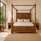 Lifestyle image of a Vishika hand carved mango wood four poster bed with teak finish, ornate floral carved headboard and footboard, for 180x200cm mattress.
